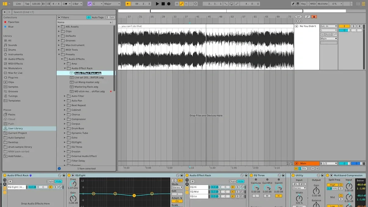 Ableton Live interface showing a mastering chain with audio effects and waveform in the arrangement view.